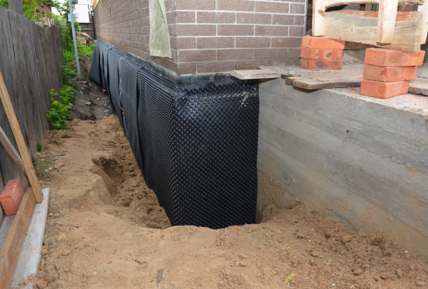 Happy homeowners after waterproofing job in Deputy